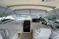 2007 Trader 42 yacht cockpit with helm, seating, and navigation equipment.