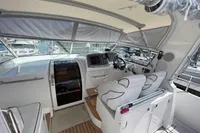Interior view of a 2007 Trader 42 yacht cockpit with modern controls and seating.