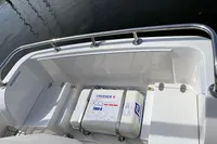 2007 Trader 42 boat deck with Cruiser 6 safety equipment, featuring sleek railing design.