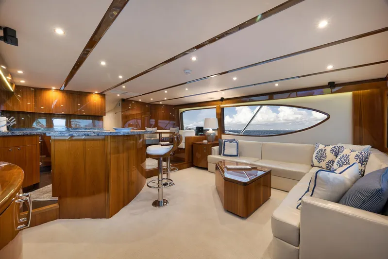 "slim Shady" Yacht Photos Pics Luxurious interior of 2015 Hatteras GT70 yacht with elegant seating and modern design.