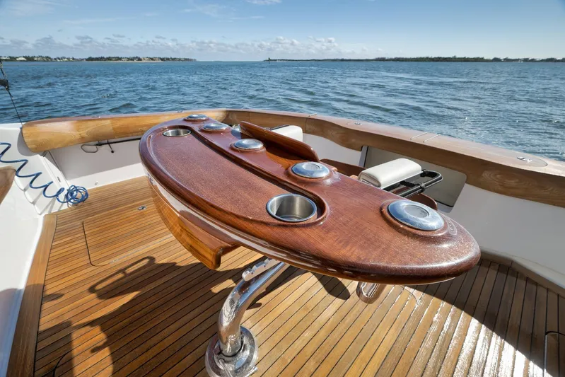 "slim Shady" Yacht Photos Pics Luxury 2015 Hatteras GT70 yacht deck with polished wood and ocean view.