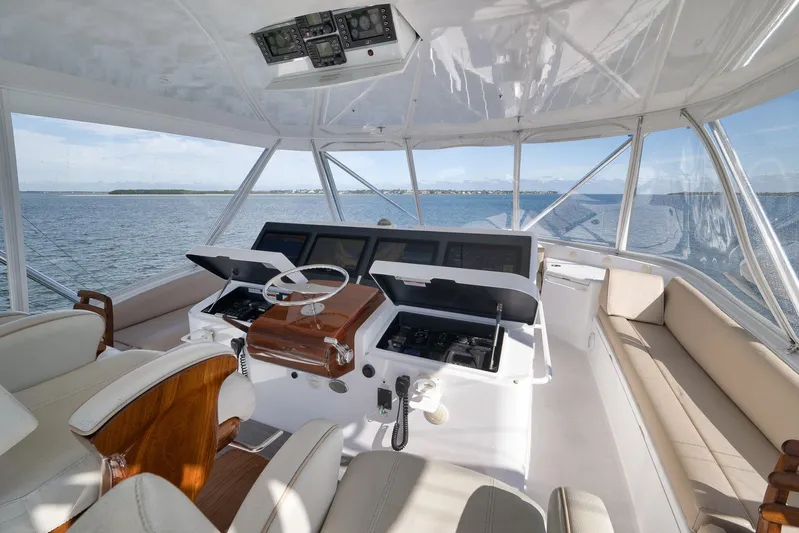 "slim Shady" Yacht Photos Pics Luxurious helm of 2015 Hatteras GT70 yacht with panoramic ocean view.