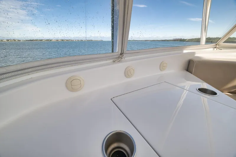 "slim Shady" Yacht Photos Pics Interior view of 2015 Hatteras GT70 yacht with ocean backdrop.