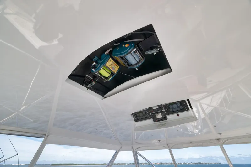 "slim Shady" Yacht Photos Pics Ceiling view of 2015 Hatteras GT70 yacht with fishing equipment and control panel.