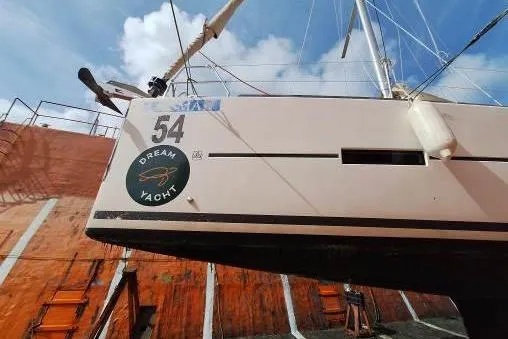 Bermuda Yacht Photos Pics 2017 Dufour 412 Grand Large yacht in dry dock, featuring "Dream Yacht" logo.