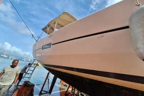 Bermuda Yacht Photos Pics 2017 Dufour 412 Grand Large sailboat docked for maintenance under clear skies.