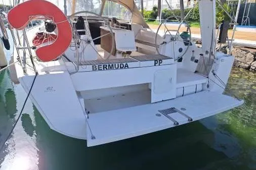 Bermuda Yacht Photos Pics 2017 Dufour 412 Grand Large yacht docked, featuring spacious deck and safety equipment.