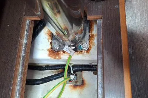 Bermuda Yacht Photos Pics 2017 Dufour 412 Grand Large yacht mast base with visible rust and wiring.