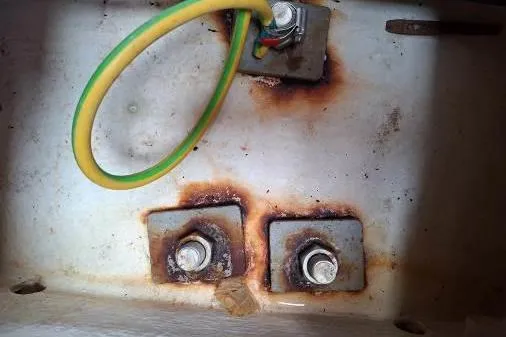 Bermuda Yacht Photos Pics Rusty bolts and wiring inside a 2017 Dufour 412 Grand Large yacht.