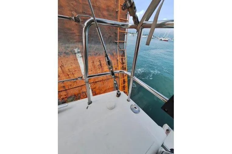 Bermuda Yacht Photos Pics 2017 Dufour 412 Grand Large yacht deck with railing, overlooking marina and water.