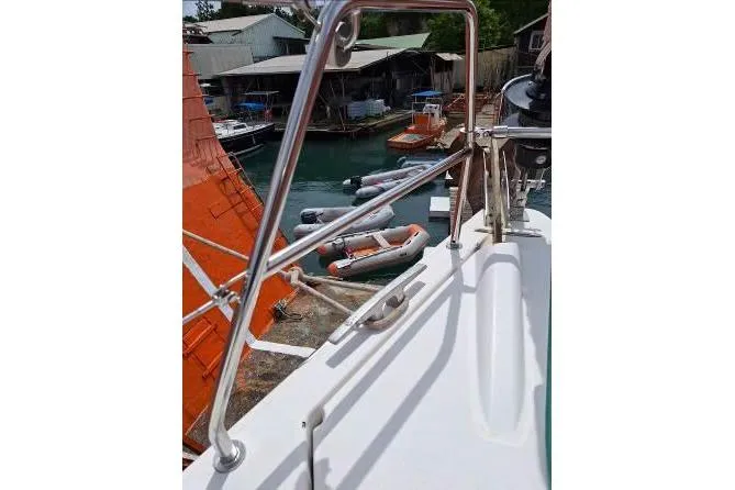 Bermuda Yacht Photos Pics Dufour 412 Grand Large 2017 yacht deck with marina view and inflatable boats.