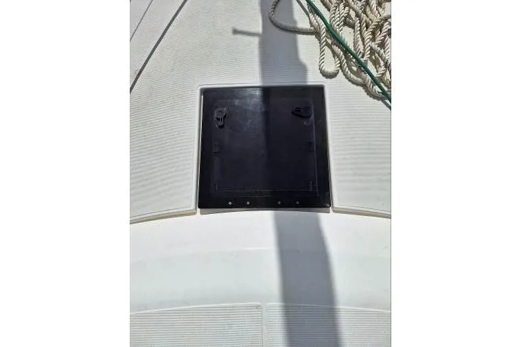 Bermuda Yacht Photos Pics Deck hatch of 2017 Dufour 412 Grand Large sailboat with coiled ropes.