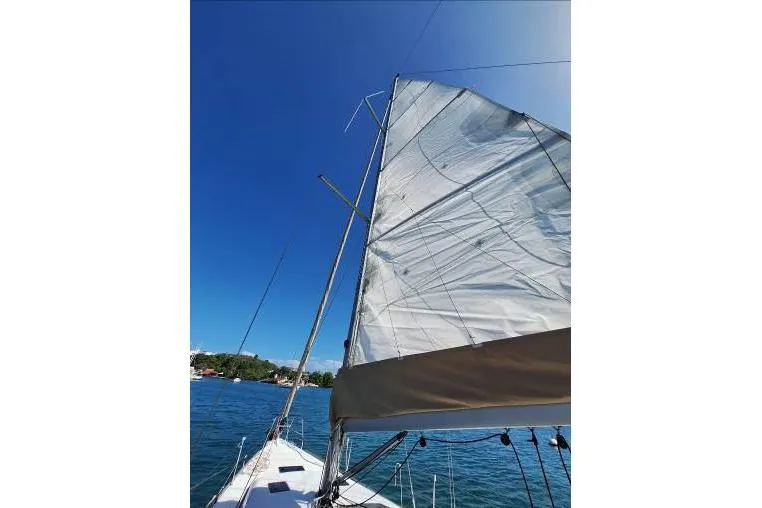 Bermuda Yacht Photos Pics Sailing on a 2017 Dufour 412 Grand Large under clear blue skies.
