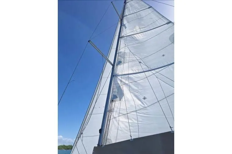 Bermuda Yacht Photos Pics Sail of 2017 Dufour 412 Grand Large yacht against clear blue sky.