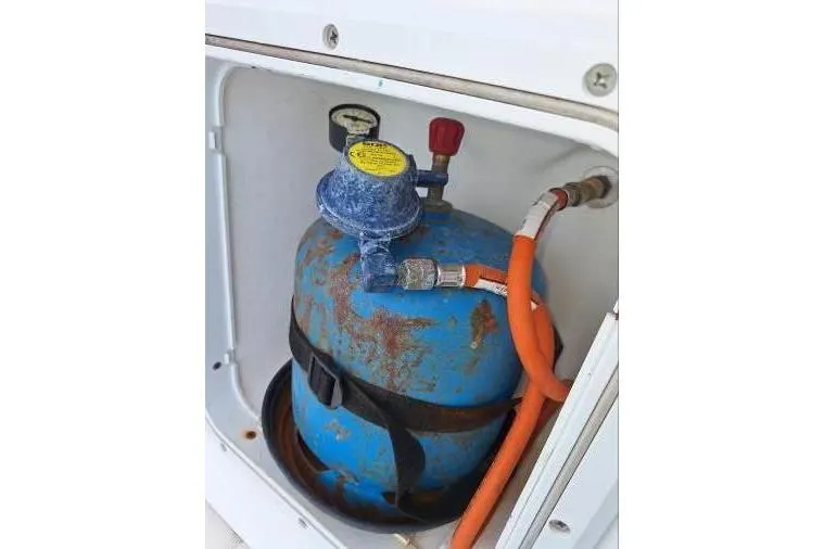Bermuda Yacht Photos Pics Rusty gas cylinder in a compartment of a 2017 Dufour 412 Grand Large yacht.