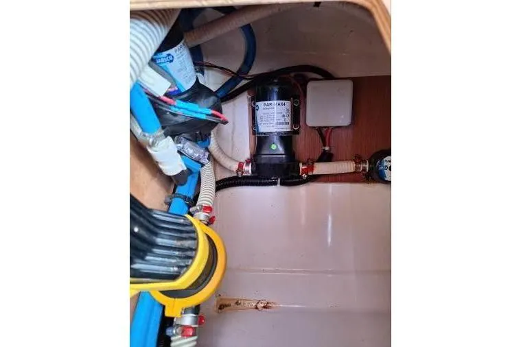 Bermuda Yacht Photos Pics Electrical system inside a 2017 Dufour 412 Grand Large yacht, featuring wiring and components.