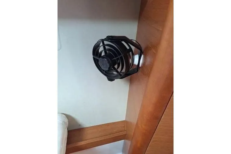 Bermuda Yacht Photos Pics Wall-mounted fan inside 2017 Dufour 412 Grand Large yacht cabin.