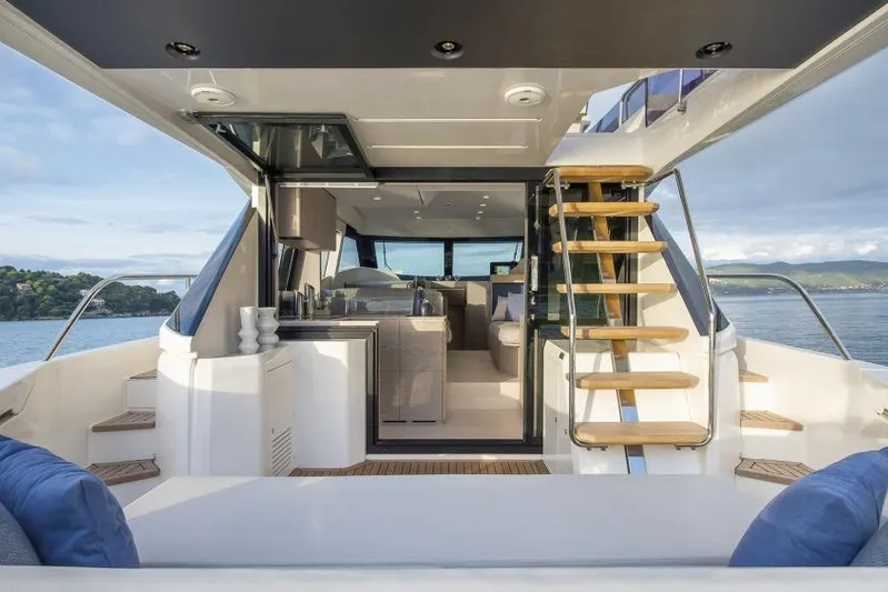  Yacht Photos Pics Luxurious 2023 Ferretti 500 yacht interior with modern design and scenic ocean view.