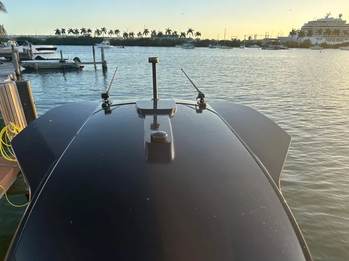 Hawk Yacht Photos Pics Sunseeker Hawk 2020 boat docked at sunset with scenic waterfront view.