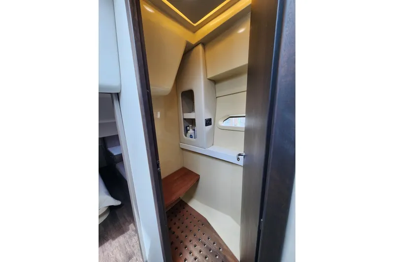  Yacht Photos Pics Interior of 2020 Regal 38 XO yacht, featuring a compact, modern bathroom space.