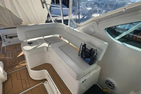 Yacht Photos Pics 2007 Tiara Yachts 3600 Open interior with white seating and wooden flooring.