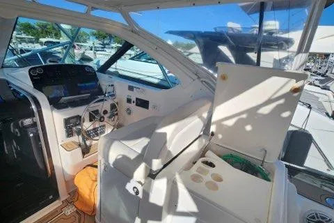  Yacht Photos Pics 2007 Tiara Yachts 3600 Open cockpit with steering wheel and control panel.
