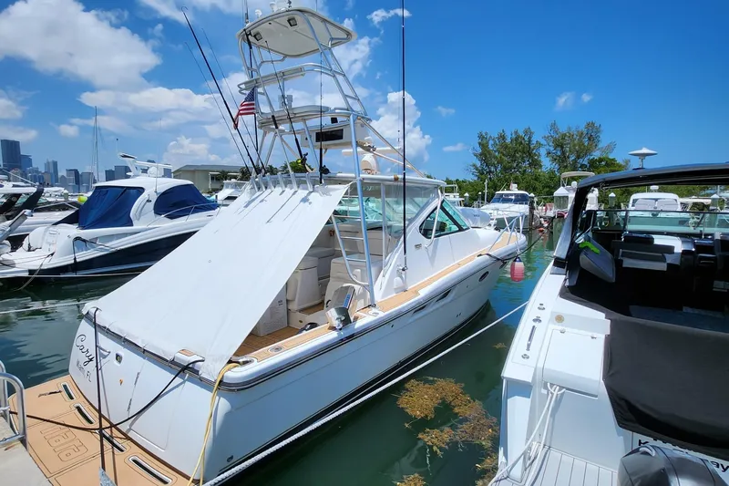  Yacht Photos Pics 2007 Tiara Yachts 3600 Open docked in a marina under a clear blue sky.