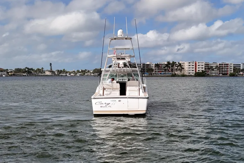  Yacht Photos Pics 2007 Tiara Yachts 3600 Open on water, Miami skyline in background.