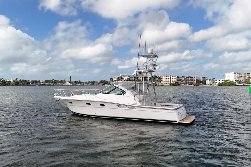  Yacht Photos Pics 2007 Tiara Yachts 3600 Open on water, under a partly cloudy sky.