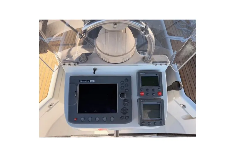 Solmare Yacht Photos Pics Control panel of 2005 Beneteau Oceanis Clipper 423 sailboat with navigation instruments.