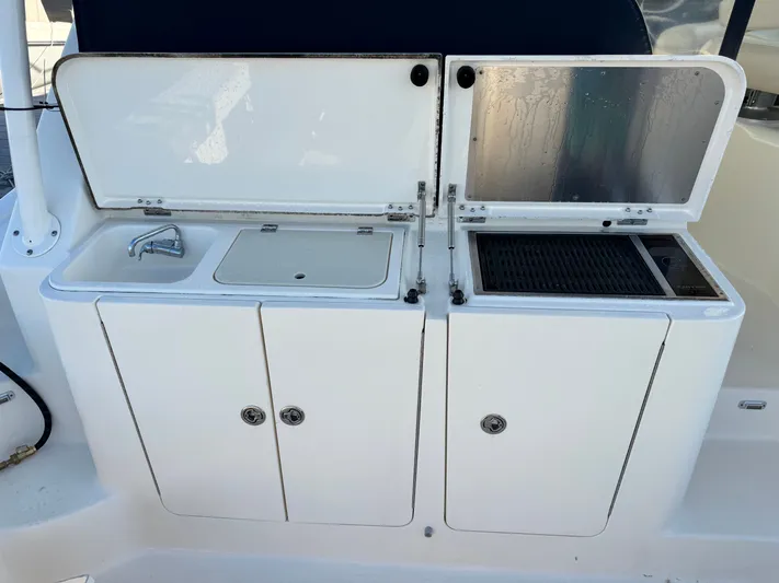 In Pursuit Yacht Photos Pics Galley on Pursuit OS 375 Offshore boat, year 2011.