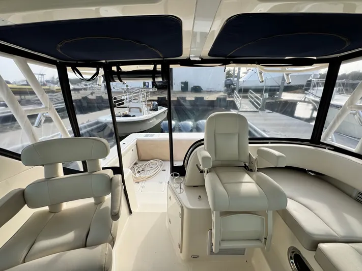 In Pursuit Yacht Photos Pics Interior of a 2011 Pursuit OS 375 Offshore yacht.