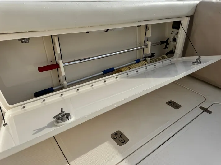 In Pursuit Yacht Photos Pics Storage compartment in 2011 Pursuit OS 375 Offshore boat.