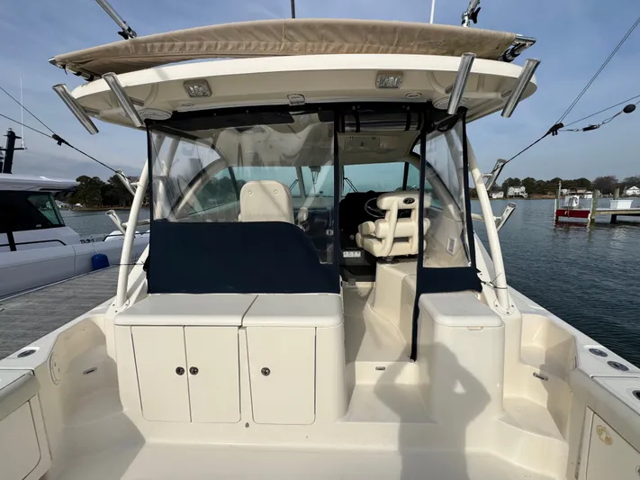 In Pursuit Yacht Photos Pics 2011 Pursuit OS 375 Offshore boat at dock.