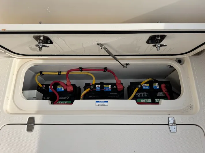 In Pursuit Yacht Photos Pics Battery compartment of a 2011 Pursuit OS 375 Offshore boat.
