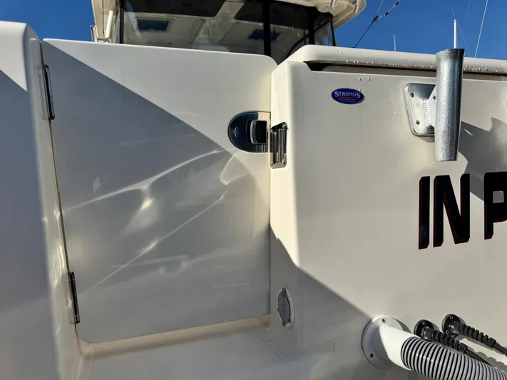 In Pursuit Yacht Photos Pics 2011 Pursuit OS 375 Offshore boat, close-up of stern.