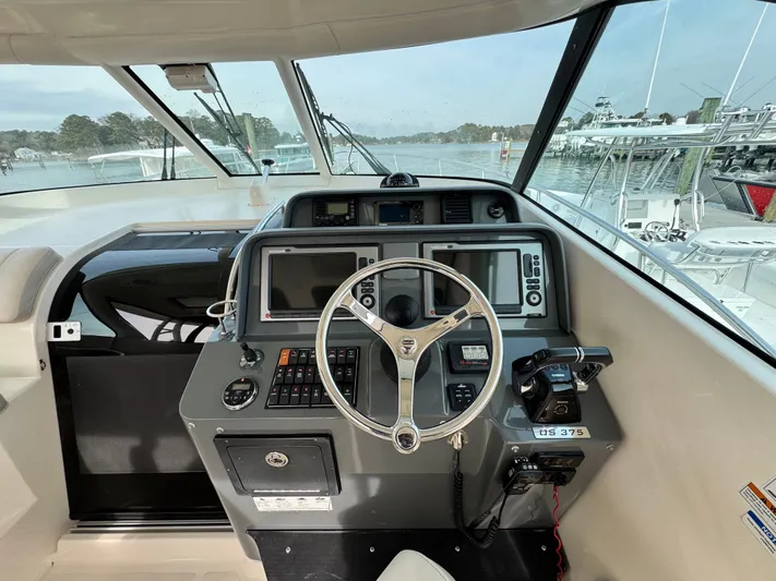 In Pursuit Yacht Photos Pics Helm of the 2011 Pursuit OS 375 Offshore yacht.