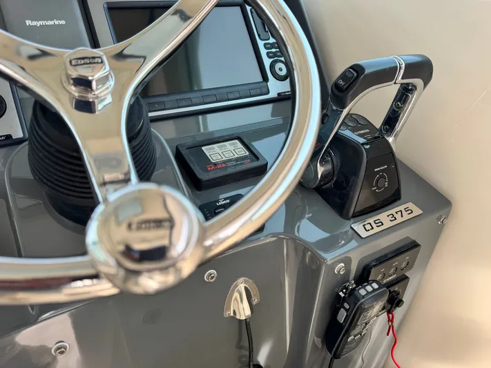 In Pursuit Yacht Photos Pics Pursuit OS 375 Offshore 2011 helm with Raymarine equipment.