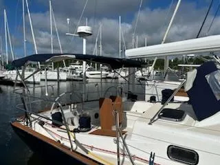 Tangaroa Yacht Photos Pics 2015 Tartan 4000 sailboat docked in marina, featuring sleek design and spacious deck.