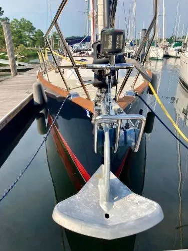 Tangaroa Yacht Photos Pics Tartan 4000 sailboat, 2015 model, docked in a marina with anchor visible.