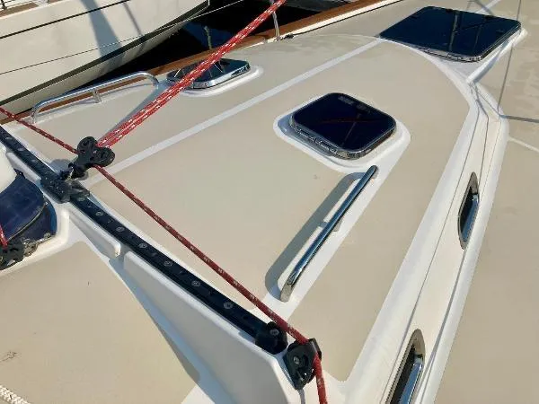 Tangaroa Yacht Photos Pics Tartan 4000 sailboat deck, 2015 model, featuring hatches and red rigging lines.