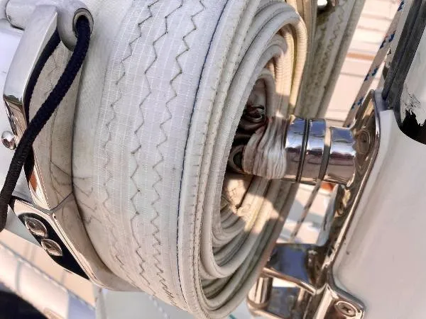 Tangaroa Yacht Photos Pics Close-up of a rolled sail on a 2015 Tartan 4000 yacht.