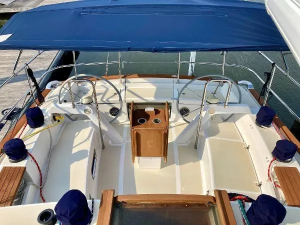 Tangaroa Yacht Photos Pics Tartan 4000 sailboat cockpit, dual steering wheels, blue canopy, 2015 model.