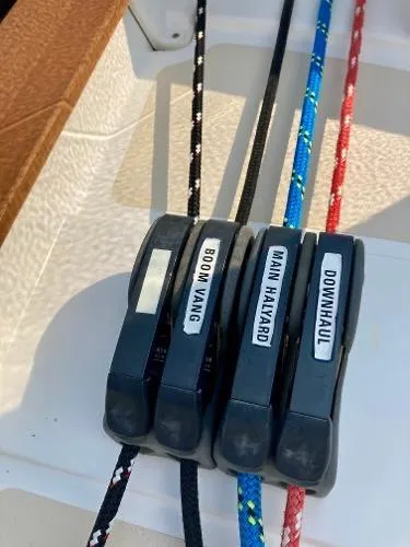 Tangaroa Yacht Photos Pics Sailing rope clutches labeled Boom Vang, Main Halyard, Downhaul on Tartan 4000, 2015 model.