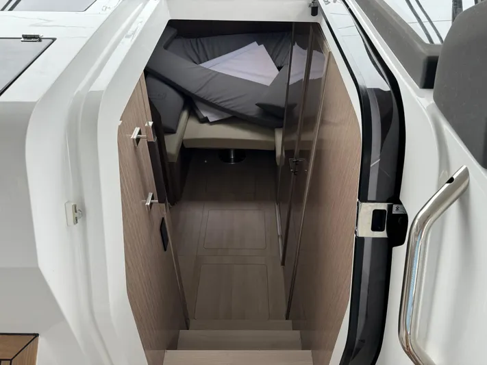  Yacht Photos Pics 2024 Sealine S335V cabin interior with wooden stairs and modern design.