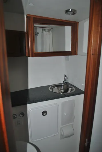  Yacht Photos Pics 2025 Ocean Sport Roamer 33' yacht bathroom with sink and mirror