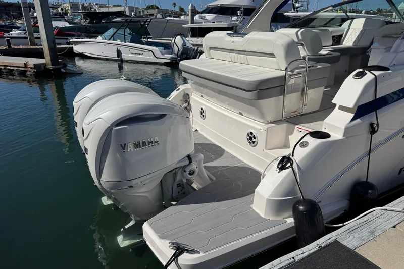 33 Xo Best Deals Of The Year!!1 Yacht Photos Pics 2026 Regal 33 XO boat with Yamaha outboard engines docked at marina.