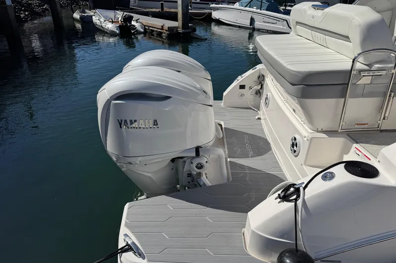 33 Xo Best Deals Of The Year!!1 Yacht Photos Pics 2026 Regal 33 XO boat with Yamaha outboard engines docked at marina.