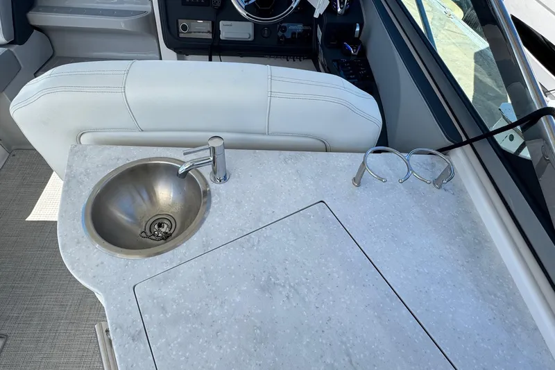 33 Xo Best Deals Of The Year!!1 Yacht Photos Pics 2026 Regal 33 XO boat interior with sink and countertop detail.