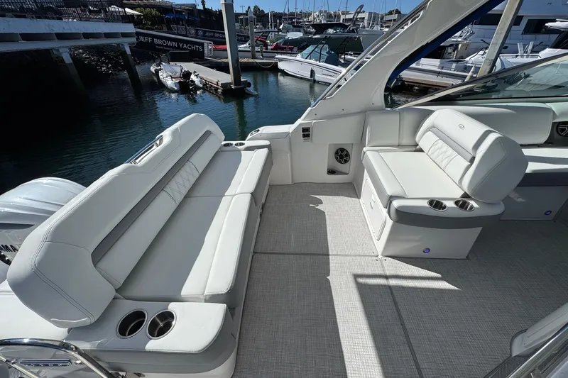 33 Xo Best Deals Of The Year!!1 Yacht Photos Pics 2026 Regal 33 XO yacht interior with luxurious seating and cup holders.